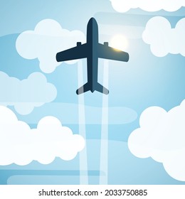 Bottom view of airplane flying in blue sky and clouds under sun