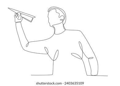 Vista inferior de un hombre jugando con un avión de papel. Dibujo de una línea de plano de papel