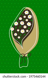 Bouquet of daisies in craft paper on a green background