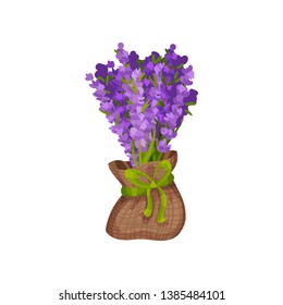 Bouquet of flowers in a bag from a sacking. Vector illustration.