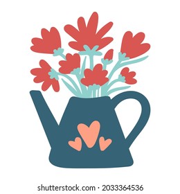 A bouquet of flowers in a garden watering can with a heart