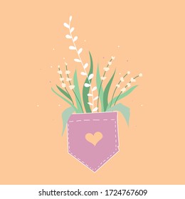 Bouquet of flowers in a pocket with a heart