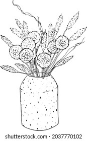 Bouquet of flowers and spikelets in a ceramic vase