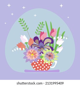 bouquet of spring flowers in a cup