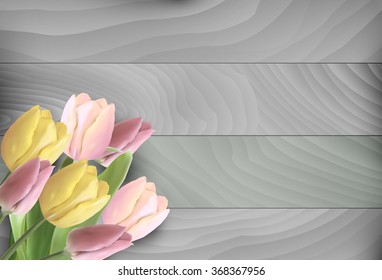 Bouquet of Tulips on wood background