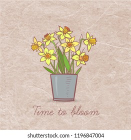 Bouquet of yellow daffodiles on vintage background.