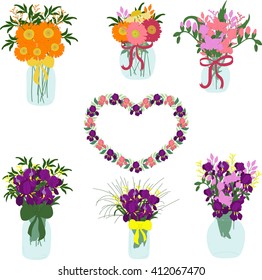 Bouquets of iris, freesia, dahlias, tulips, herbera in jars