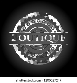 Boutique on grey camouflaged texture
