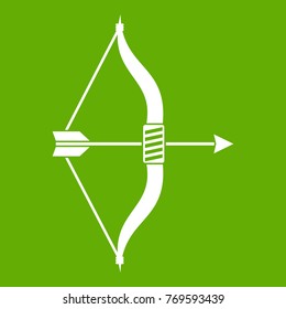 Bow and arrow icon white isolated on green background. Vector illustration