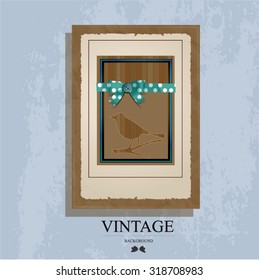 Bow with frame on a textural background. Vintage