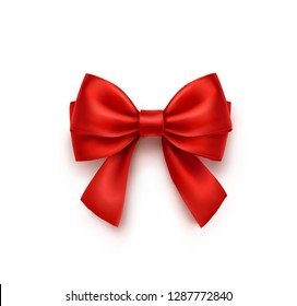 Bow isolated on white background. Vector Christmas red satin bow with shadow, xmas wrap element template.