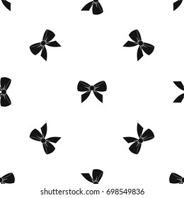 Bow pattern repeat seamless in black color for any design. Vector geometric illustration