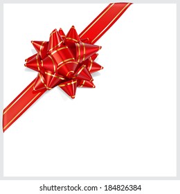 Bow of red ribbon with gold stripes with shadow on white background. Located diagonally