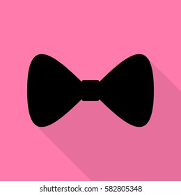 Bow Tie icon. Black icon with flat style shadow path on pink background.