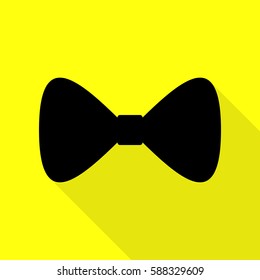 Bow Tie icon. Black icon with flat style shadow path on yellow background.