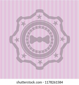 bow tie icon inside badge with pink background