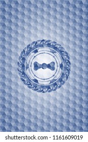 bow tie icon inside blue badge with geometric background.