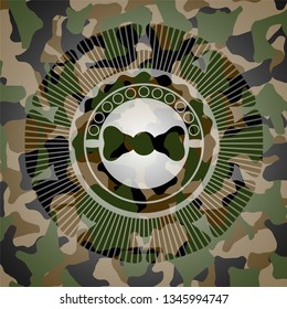 bow tie icon inside camouflage texture