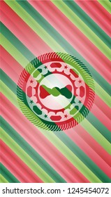 bow tie icon inside christmas emblem.