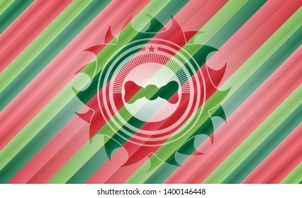bow tie icon inside christmas badge.