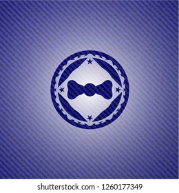 bow tie icon inside denim background