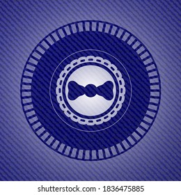 bow tie icon inside denim background. 