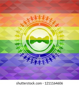 bow tie icon inside emblem on mosaic background with the colors of the LGBT flag