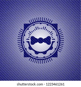 bow tie icon inside emblem with denim high quality background