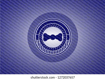 bow tie icon inside emblem with denim texture