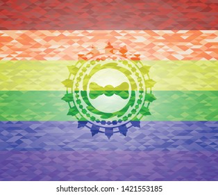 bow tie icon inside emblem on mosaic background with the colors of the LGBT flag