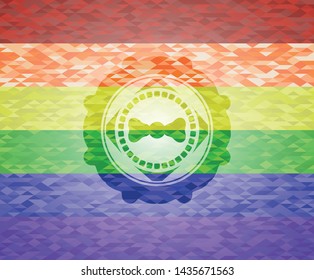 bow tie icon inside emblem on mosaic background with the colors of the LGBT flag