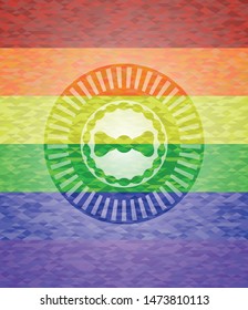 bow tie icon inside emblem on mosaic background with the colors of the LGBT flag