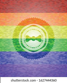 bow tie icon inside emblem on mosaic background with the colors of the LGBT flag