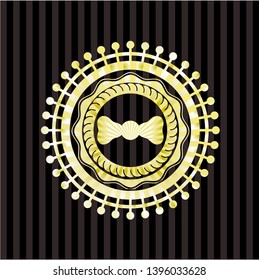 bow tie icon inside gold emblem