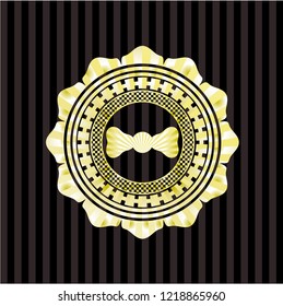 bow tie icon inside golden emblem or badge