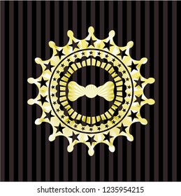 bow tie icon inside golden emblem