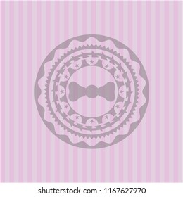 bow tie icon inside pink emblem. Retro