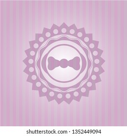 bow tie icon inside pink emblem