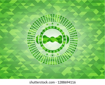 bow tie icon inside realistic green mosaic emblem - Powered by Shutterstock - Get 15% off with code: PIKWIZARD15