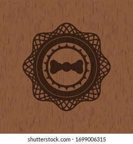 bow tie icon inside realistic wooden emblem