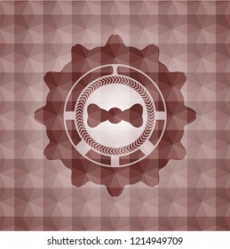 bow tie icon inside red seamless emblem with geometric pattern.