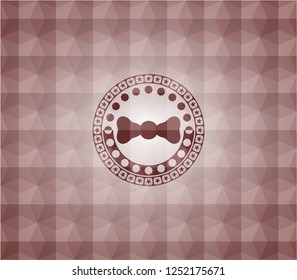 bow tie icon inside red seamless geometric emblem.