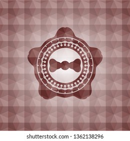 bow tie icon inside red seamless emblem or badge with abstract geometric polygonal pattern background.