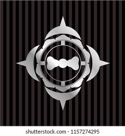 bow tie icon inside silver emblem