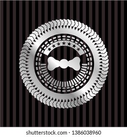 bow tie icon inside silver emblem
