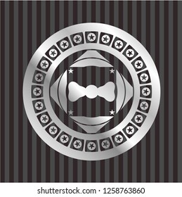 bow tie icon inside silvery badge or emblem