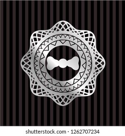 bow tie icon inside silvery shiny emblem