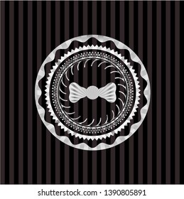 bow tie icon inside silvery shiny badge