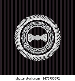 bow tie icon inside silvery badge or emblem