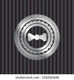 bow tie icon inside silvery badge or emblem